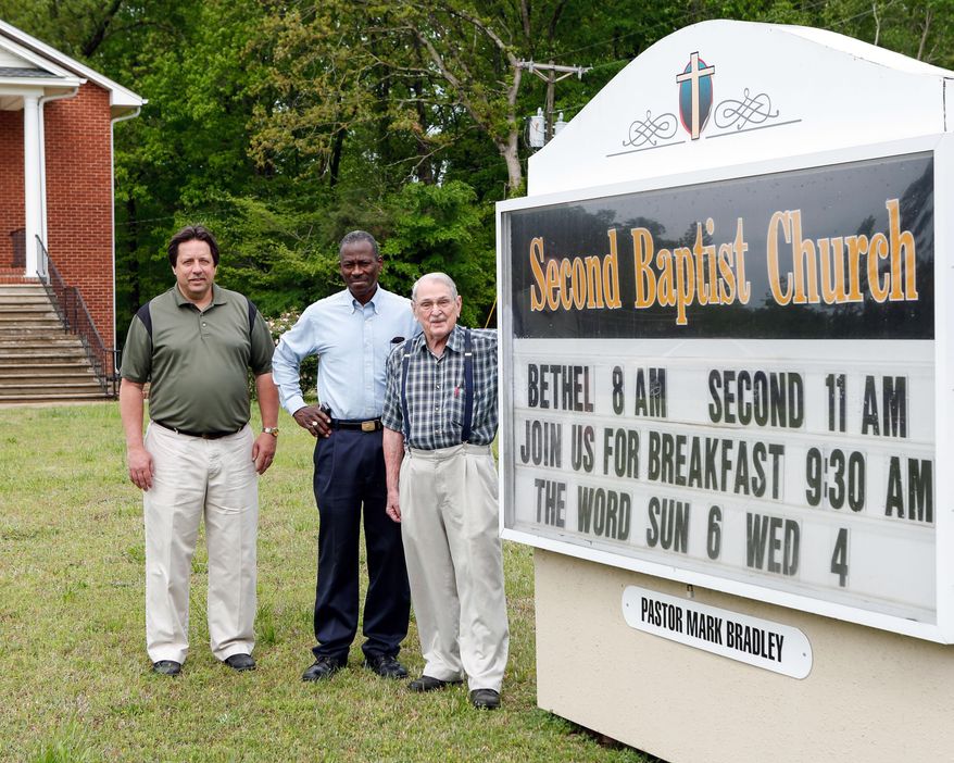 ADVANCE FOR USE SUNDAY, MAY 11 AND THEREAFTER - In this April 30, 2014 photo, from left, Second Baptist Church Pastor Mark Bradley, the Rev. Robert Crawford of Bethel Baptist Church, and Second Baptist Associate Pastor Bob Porterfield stand outside Second Baptist Church near Rock Hill, S.C. (AP Photo/The Herald, Jeff Sochko)