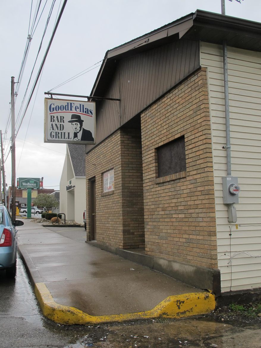 ADVANCE FOR MONDAY MAY 12 AND THEREAFTER This Tuesday April 29, 2014 photo shows Goodfellas Bar & Grill in McMechen, W. Va. An oil and gas worker was arrested immediately after an alleged stabbing incident last week at the bar. (AP Photo/The Intelligencer and Wheeling News-Register, Sarah Harmon)