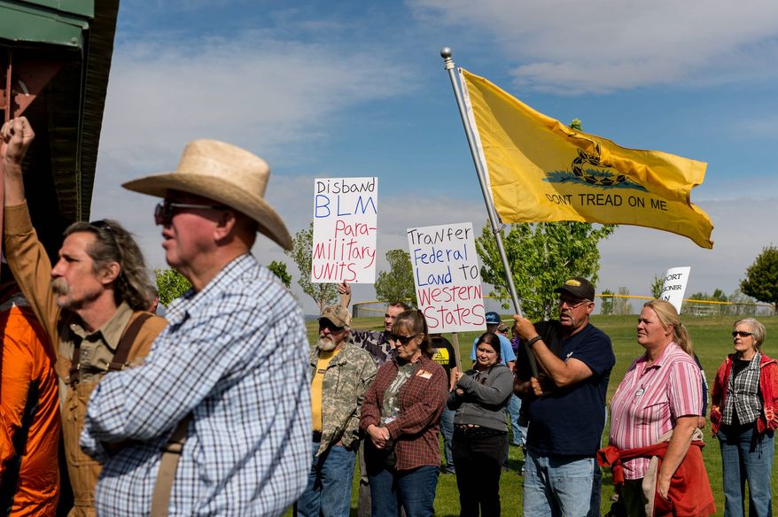 A crowd gathers to hear San Juan County Commissioner Phil Lyman, who organized an ATV protest ride into Recapture Canyon. The area was closed to motorized use after the discovery of an illegal trail that cuts through ancestral Puebloan archaeological sites. The canyon is open to hikers and horseback riders. (Associated Press)