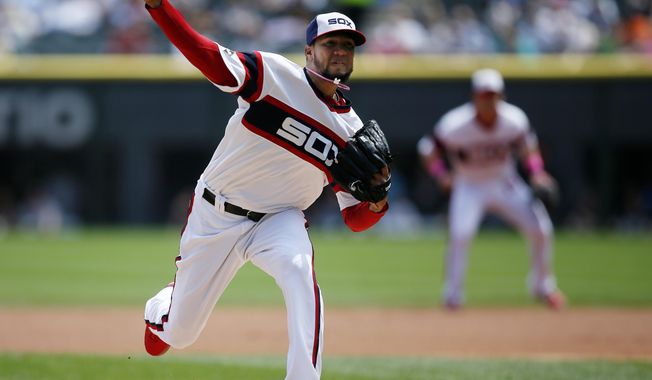 Chicago White Sox starting pitcher Hector Noesi delivers against the Arizona Diamondbacks during the first inning of a baseball game on Sunday, May 11, 2014, in Chicago. (AP Photo/Andrew A. Nelles)