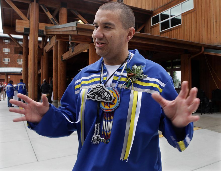 Saying,"His legacy is going to live on until the end of time," Willie Frank recalls his father, Billy Frank Jr. at a Sunday, May 11, 2014 public memorial at the Little Creek Casino near Shelton,Wash. honoring the environmental and native fishing rights champion who passed away May 5th. An overflow audience estimated at 6,000 filled the Squaxin Island Events Center along with adjacent portable tents and nearby hotel rooms to honor the 83 year-old Nisqually tribal elder and chairman of the Northwest Indian Fisheries Commission. Speakers included Gov. Jay Inslee. U.S. Senators Patty Murray and Maria Cantwell and Squaxin Island Tribe Chairman David Lopeman. (AP Photo/The Olympian, Steve Bloom)