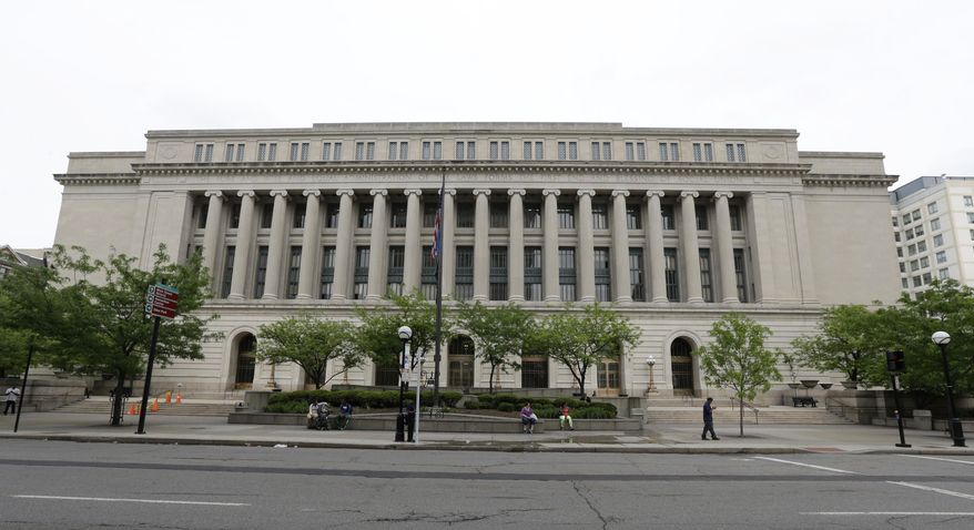 This photo made Friday, May 9, 2014, shows the Hamilton County Courthouse in Cincinnati. The courthouse was built in 1915. This weekend, county officials from around the state are gathering in Columbus for the Ohio Courthouse Symposium to share ideas with historic preservationists, judges, architects and others for preserving the state’s many historically significant county-seat edifices. (AP Photo/Al Behrman)