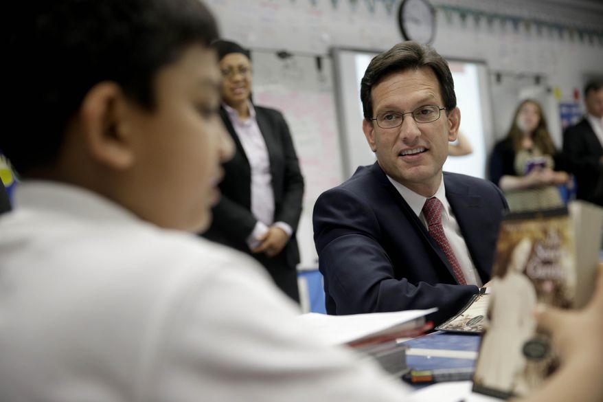 House Majority Leader Eric Cantor visits with students at the Bronx Charter School of Excellence in New York, Monday, May 12, 2014. Cantor visited the New York City charter school as part of his national education policy tour. (AP Photo)