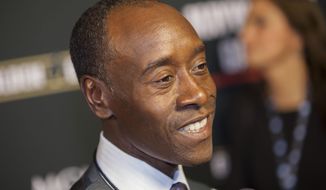 FILE - In this Sept. 14, 2013 file photo, Don Cheadle arrives at the VIP Pre-Fight Party for the One: Mayweather vs. Canelo Fight at the MGM Grand Garden Arena in  Las Vegas. The Greater Cincinnati &amp;amp; Northern Kentucky Film Commission announced Monday, May 12, 2014, the filming plans for the Miles Davis biopic &amp;quot;Miles Ahead&amp;quot; is set to film in Cincinnati this summer. Cheadle will star as Davis with Ewan McGregor and Zoe Saldana. Cheadle is also a producer, and wrote the screenplay with Steven Baigelman. (Photo by Eric Jamison/Invision/AP, File)