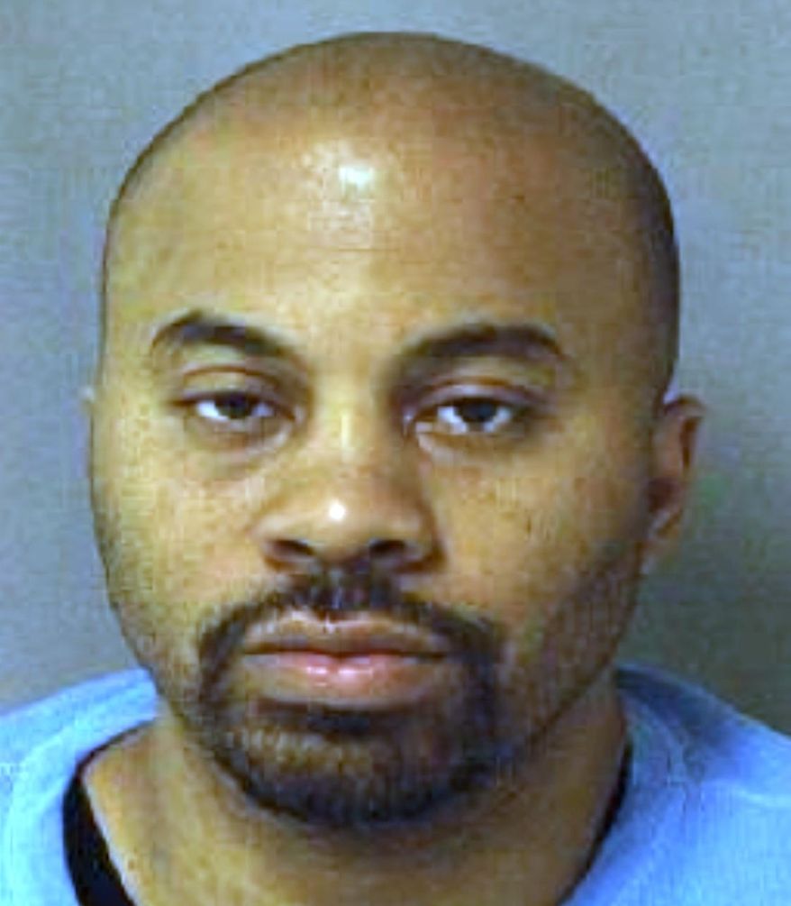 In an undated photo provided by the United States Marshals Service, Carlos Powell is seen. Federal officials are seeking three men convicted by a jury in Detroit for their roles in what authorities describe as a "massive drug ring" that trafficked heroin, cocaine and marijuana. The U.S. Attorney's office says 39-year-old Carlos Powell, 36-year-old Eric Powell and 38-year-old Earnest Lee Proge Jr., were not in the downtown courtroom when the jury returned its verdict Monday, May 12, 2014. U.S. Attorney's spokeswoman Gina Balaya says Carlos Powell was in the courtroom Monday morning, but it's not clear if the other men were there. (AP Photo/United States Marshals Service)