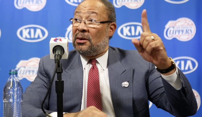 Dick Parsons, the former Citigroup chairman and former Time Warner chairman and CEO, who was named  interim CEO of the Los Angeles Clippers by the NBA league, takes questions during a news conference at the Staples Center in Los Angeles Monday, May 12, 2014. (AP Photo)