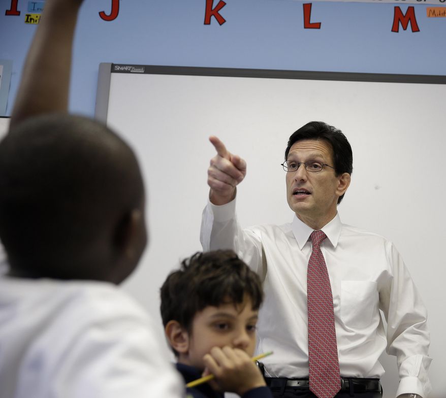 House Majority Leader Eric Cantor visits with students at the Bronx Charter School of Excellence in New York, Monday, May 12, 2014. Cantor visited the New York City charter school as part of his national education policy tour. (AP Photo)