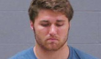 In this May 11, 2014 booking photo provided by Blue Earth County Jail, Philip Nelson, 20, is seen. The former Minnesota Gophers quarterback was arrested in Mankato, Minn., early Sunday, May 11, 2014, on suspicion of third-degree assault. Former Minnesota State, Mankato, linebacker Isaac Dallas Kolstad was in critical condition Monday after an alleged assault involving Nelson. (AP Photo/Blue Earth County Jail)