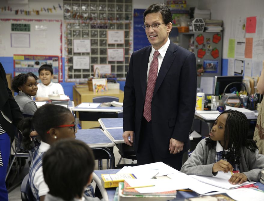 House Majority Leader Eric Cantor visits with students at the Bronx Charter School of Excellence in New York, Monday, May 12, 2014. Cantor visited the New York City charter school as part of his national education policy tour. (AP Photo)