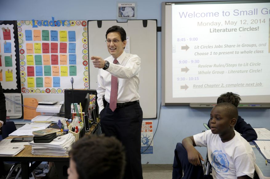 House Majority Leader Eric Cantor visits with students at the Bronx Charter School of Excellence in New York, Monday, May 12, 2014. Cantor visited the New York City charter school as part of his national education policy tour. (AP Photo)