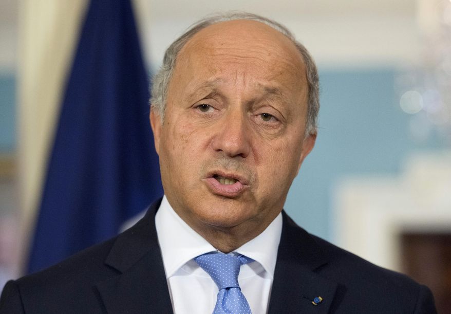 French Foreign Minister Laurent Fabius speaks to the media before his meeting with Secretary of State John Kerry at the State Department in Washington, Tuesday, May 13, 2014. (AP Photo/Molly Riley)
