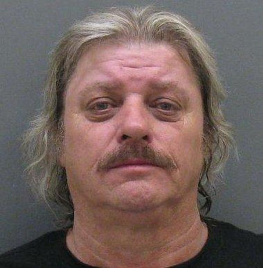 This booking photo provided by the Ottawa County Sheriff, shows Dallas Smallwood, a man accused of escaping from a South Carolina jail nearly 40 years ago. Smallwood has been captured in western Michigan. Federal marshals say Smallwood was arrested Monday, May 12, 2014, in Zeeland, 25 miles southwest of Grand Rapids. He's accused of escaping from an Anderson County, South Carolina, jail in 1977 while under a five-year sentence for grand larceny and receiving stolen goods. The U.S. Marshals Service says Smallwood, a trucker, was using the name Waylon Wilson. (AP Photo/Ottawa County Sheriff