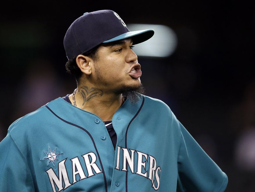 Seattle Mariners starting pitcher Felix Hernandez screams toward an umpire while being relieved against the Tampa Bay Rays in the seventh inning of a baseball game Monday, May 12, 2014, in Seattle. Hernandez was ejected. (AP Photo)