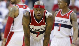 Washington Wizards forward Al Harrington (7) looks down court during the first half of Game 4 of an Eastern Conference semifinal NBA basketball playoff game against the Indiana Pacers in Washington, Sunday, May 11, 2014. (AP Photo/Alex Brandon)