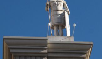 FILE - This file photo taken Dec. 27, 2013, shows a statue of a Roman centurion atop the Caesars Atlantic City casino in Atlantic City, N.J. Figures released on May 14, 2014 showed that Internet gambling in New Jersey saw its first slight decline in April 2014, to $11.4 million. (AP Photo/Wayne Parry, File)