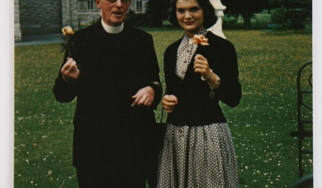 In this image made available by Sheppard&#x27;s Irish Auction House made available on Wednesday May 14, 2014 shows Rev. Joseph Leonard with Jacqueline Kennedy at All Hallows College in Dublin Ireland in 1950.  Letters written by Jacqueline Kennedy to an Irish priest have revealed new details about her closely guarded private thoughts. The letters are set to be auctioned next month and could fetch up to $1.6 million. The more than 30 letters were written to the Rev. Joseph Leonard. They were recently discovered in a drawer at All Hallows College. In one, she questioned her faith after the assassination of President John F. Kennedy. &amp;quot;I am so bitter against God,&amp;quot; she wrote a few months after the assassination of her husband. (AP Photo/Sheppard&#x27;s Irish Auction House) NO ARCHIVE ONE TIME USE ONLY  ONLY TO BE USE IN CONNECTION WITH STORY RELATED TO THE AUCTION
