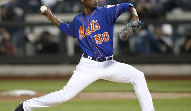 New York Mets starting pitcher Rafael Montero (50) delivers in the second inning against the New York Yankees in a baseball game in New York, Wednesday, May 14, 2014. (AP Photo/)