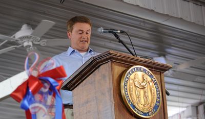 FILE - In this Saturday, Aug. 3, 2013, file photo, Kentucky Commissioner of Agriculture James Comer, R-Thompkinsville, speaks during the 133rd annual Fancy Farm picnic in Fancy Farm, Ky.  Kentucky&#39;s Agriculture Department has filed a lawsuit s Wednesday, May, 2014, seeking the release of imported hemp seeds being held up by federal officials. The state Agriculture Department wants to distribute the seeds for use in pilot projects that would be Kentucky&#39;s first hemp crop in decades. Holly Harris VonLuehrte , chief of staff to Comer, says federal officials wanted the state to apply for a permit.  (AP Photo/Stephen Lance Dennee)