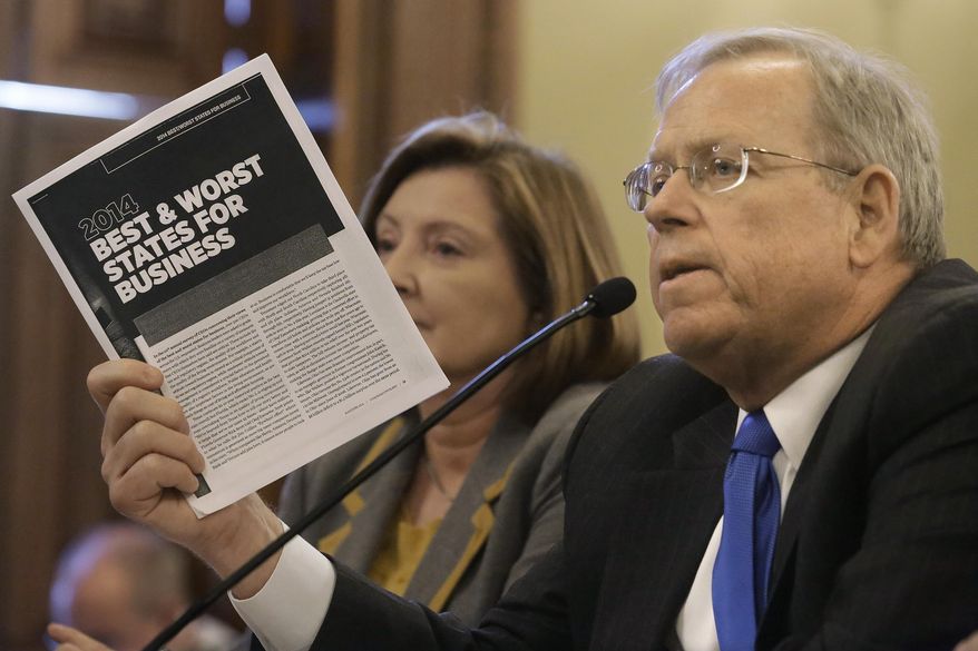 Doug Whitley, president and CEO of the Illinois Chamber of Commerce, testifies during a committee hearing at the Illinois State Capitol Wednesday, May 14, 2014, in Springfield, Ill. As they craft their own state budget proposal, lawmakers face a number of options in how to proceed while Democratic leaders are still trying to wrangle the votes for the extension of an income tax hike needed to fund it. (AP Photo)
