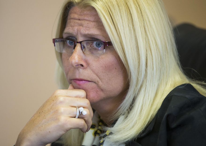 FILE--This April 22, 2014 file photo shows Sharon Helman, medical center director of Phoenix Veterans Affairs Health Care Center in Phoenix. The Phoenix hospital’s director has scoffed at the notion that she would direct staff to create a secret list and watch patients die in order to pad her pockets. (AP Photo/The Arizona Republic, Michael Chow)