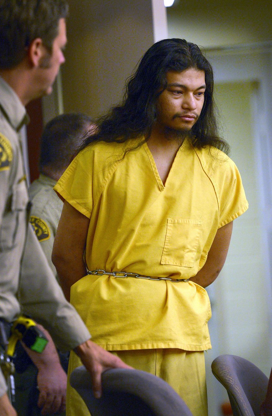 Esar Met, a 27-year-old Burmese refugee, enters the courtroom for his sentencing hearing Wednesday, May 14, 2014, in Salt Lake City, Utah. Met, convicted of killing a 7-year-old girl from his Utah neighborhood, was sentenced to life without possibility of parole. (AP Photo/The Salt Lake Tribune, Leah Hogsten, Pool)