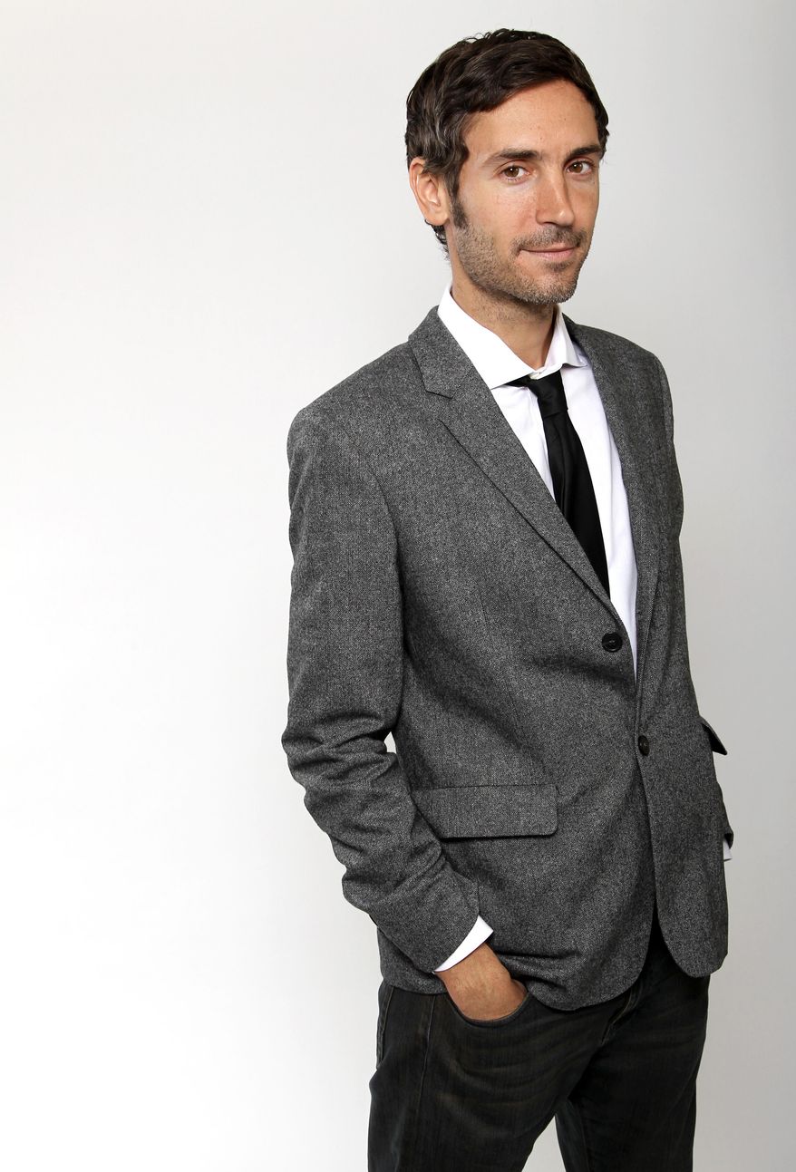 FILE - This Feb. 4, 2013 file photo shows director Malik Bendjelloul posing for a portrait at the 2013 Oscar Nominee Luncheon in Los Angeles. Police in Sweden say Malik Bendjelloul the film director behind the Oscar-awarded music documentary "Searching for Sugarman," has died. He was 36. Police spokeswoman Pia Glenvik said Bendjelloul died in Stockholm late Tuesday, May 13, 2014, but wouldn't specify the cause of death. (Photo by Matt Sayles/Invision/AP, File)