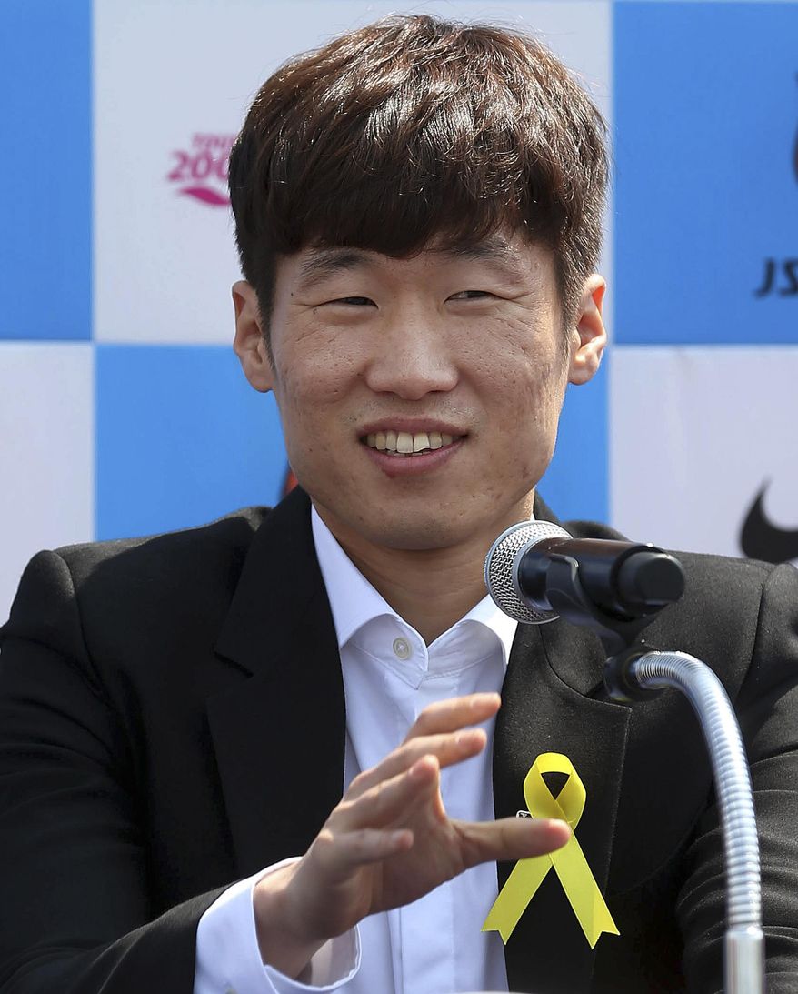 Park Ji-sung, a former Manchester United regular and one of the stars of South Korea's run to the 2002 World Cup soccer semifinals, speaks during a press conference in Suwon, South Korea, Wednesday, May 14, 2014. Park announced his retirement from top-flight football. (AP Photo/Yonhap, Kim Soo-jin) KOREA OUT