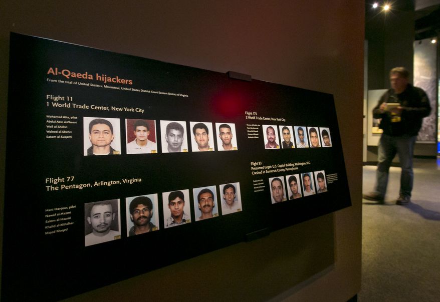 Portraits of the Al-Qaeda hijackers are displayed at the National Sept. 11 Memorial Museum, Wednesday, May 14, 2014, in New York. The museum is a monument to how the Sept. 11 terror attacks shaped history, from its heart-wrenching artifacts to the underground space that houses them amid the remnants of the fallen twin towers&#39; foundations. It also reflects the complexity of crafting a public understanding of the terrorist attacks and reconceiving ground zero.  (AP Photo)