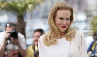 Actress Nicole Kidman poses for photographers during a photo call for Grace of Monaco at the 67th international film festival, Cannes, southern France, Wednesday, May 14, 2014. (AP Photo/Alastair Grant)