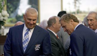 NASCAR racing legends Dale Jarrett, left, and Rusty Wallace are seated on the House floor during the opening session of the General Assembly in Raleigh, N.C., Wednesday, May 14, 2014 where lawmakers honored the NASCAR Hall of Fame inductees. (AP Photo)  **FILE**