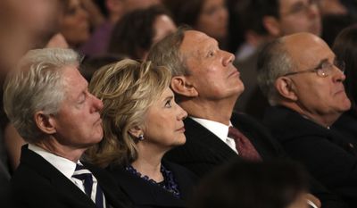 From left, Former U.S. President Bill Clinton sits with his wife former U.S. Secretary of State Hillary Clinton, former New York Governor George Pataki and former New York City Mayor Rudolph Giuliani during the dedication ceremony at the National September 11 Memorial Museum in New York, Thursday,  May 15, 2014.  (AP Photo/Mike Segar, Pool)