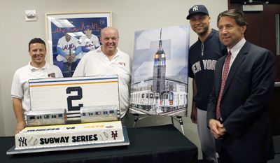 From left, cake designers Joe Faugno and Mauro Castano pose with New York Yankees shortstop Derek Jeter and New York Mets Chief Operating Officer Jeff Wilpon after the Mets presented Jeter with a cake designed for the final game of the Subway Series before a baseball game between the Yankees and the Mets in New York, Thursday, May 15, 2014. (AP Photo/Kathy Willens)