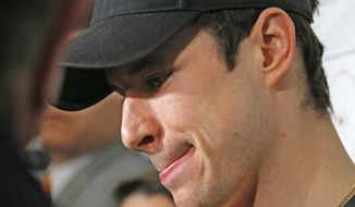 Pittsburgh Penguins captain Sidney Crosby listens to a reporter&#39;s question in the Penguins&#39; locker room at the Consol Energy Center in Pittsburgh, Thursday, May 15, 2014. When Crosby lifted the Stanley Cup in triumph on that warm night in Detroit five years ago, it was supposed to mark the beginning of hockey&#39;s next dynasty. That hasn&#39;t materialized.  (AP Photo/Gene J. Puskar)