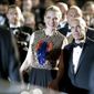 Head of Dreamworks Jeffrey Katzenberg, right, and actress Cate Blanchett leave after the screening of How To Train Your Dragon 2 at the 67th international film festival, Cannes, southern France, Friday, May 16, 2014. (AP Photo/Thibault Camus)