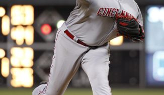 Cincinnati Reds&#39; starting pitcher Alfredo Simon pitches during the fourth inning of a baseball game against the Philadelphia Phillies, Friday, May 16, 2014, in Philadelphia. (AP Photo/Chris Szagola)