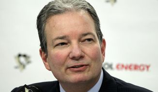 FILE - In this April 12, 2012, file photo, Pittsburgh Penguins general manager Ray Shero talks with reporters as the NHL hockey team cleared out their locker room at the Consol Energy Center in Pittsburgh. The Penguins have fired Shero on Friday, May 16, 2014, while the status of coach Dan Bylsma will be evaluated. (AP Photo/Gene J. Puskar, File)