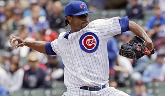 Chicago Cubs starter Edwin Jackson throws against the Milwaukee Brewers during the first inning of a baseball game in Chicago, Saturday, May 17, 2014. (AP Photo/Nam Y. Huh)
