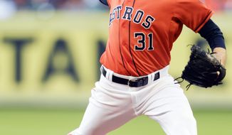 Houston Astros starting pitcher Collin McHugh  throws in the first inning against the Chicago White Sox during a baseball game on Friday, May 16, 2014, in Houston. (AP Photo/Bob Levey)
