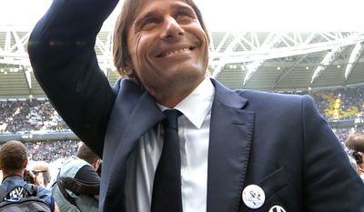 Juventus coach Antonio Conte greets supporters prior to a Serie A soccer match between Juventus and Cagliari at the Juventus stadium, in Turin, Italy, Sunday, May 18, 2014. (AP Photo/Massimo Pinca)