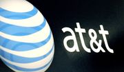 In this Oct. 19, 2009, file photo, the AT&amp;T logo is on display at a RadioShack store in Gloucester, Mass. (AP Photo/Lisa Poole, File) ** FILE **