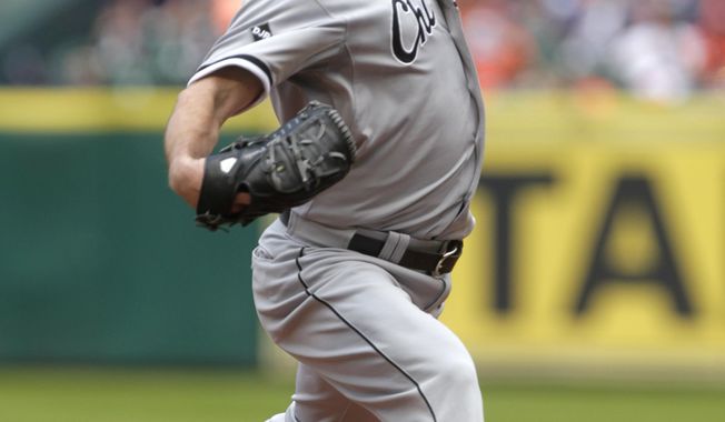 Chicago White Sox pitcher John Danks throws during the first inning of a baseball game against the Houston Astros, Sunday, May 18, 2014, in Houston. (AP Photo/Patric Schneider)