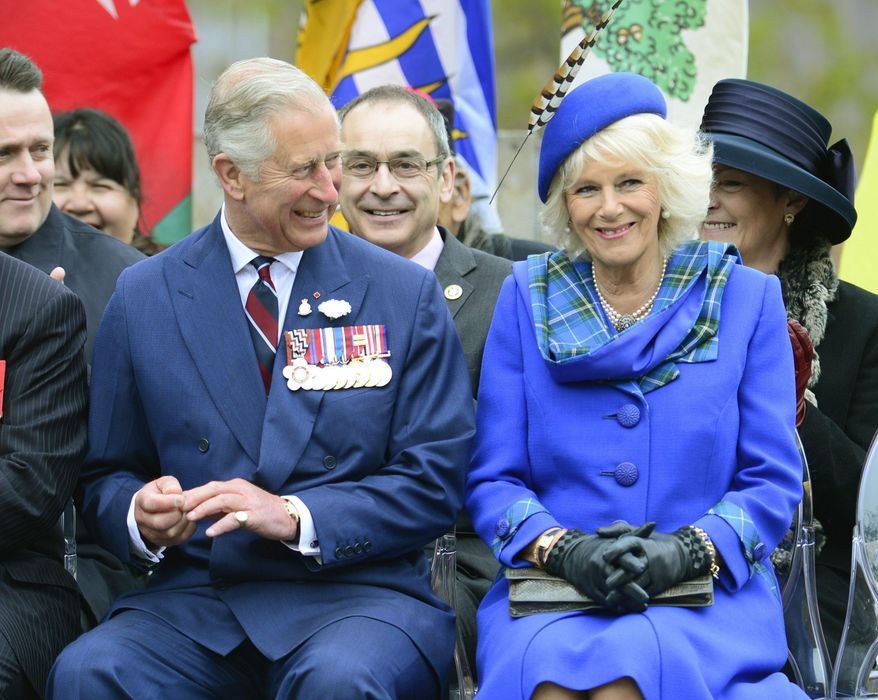 Prince Charles and his wife Camilla, the Duchess of Cornwall, smile during an event in Halifax, Nova Scotia on Monday, May 19, 2014.  Prince Charles and Camilla are visiting Nova Scotia, Prince Edward Island and Manitoba. (AP Photo/The Canadian Press, Paul Chiasson)