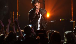 Robin Thicke performs on stage at the Billboard Music Awards at the MGM Grand Garden Arena on Sunday, May 18, 2014, in Las Vegas. (Photo by Chris Pizzello/Invision/AP)