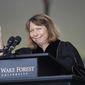 Jill Abramson, former executive editor of The New York Times, waves as she speaks at the commencement ceremony at Wake Forest University in Winston-Salem, N.C., Monday, May 19, 2014. (AP Photo/Nell Redmond)
