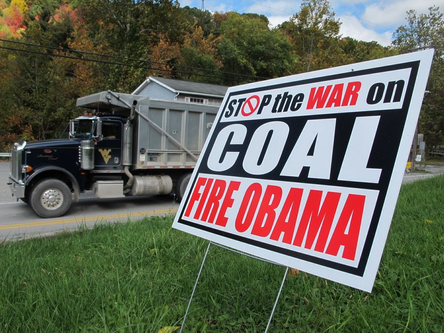 New EPA rules on coal-fired power plants will in effect "ban one of America's most abundant energy sources, coal" and "drive up electricity costs," writes Ben Carson. (AP Photo/Vicki Smith)
