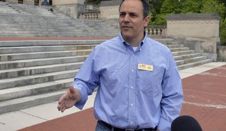 ** FILE ** In this May 16, 2014, photo Kentucky Republican senatorial candidate Matt Bevin speaks with reporters on the steps of the Kentucky State Capitol in Frankfort, Ky. (AP Photo/Timothy D. Easley)