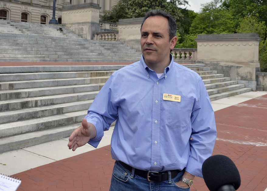** FILE ** In this May 16, 2014, photo Kentucky Republican senatorial candidate Matt Bevin speaks with reporters on the steps of the Kentucky State Capitol in Frankfort, Ky. (AP Photo/Timothy D. Easley)