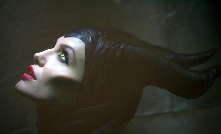 This June 14, 2012 image released by Disney Enterprises, Inc., shows actress Angelina Jolie in the title role of "Maleficent," the villain from the 1959 classic "Sleeping Beauty." The film releases in theaters in the U.S. on May 30, 2014. (AP Photo/Disney Enterprises, Inc., Greg Williams)