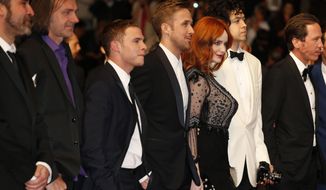 From third left, actor Iain De Caestecker, director Ryan Gosling, actress Christina Hendricks and Geoffrey Arend arrive for the screening of Two Days, One Night (Deux jours, une nuit) at the 67th international film festival, Cannes, southern France, Tuesday, May 20, 2014. (AP Photo/Alastair Grant)