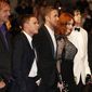 From third left, actor Iain De Caestecker, director Ryan Gosling, actress Christina Hendricks and Geoffrey Arend arrive for the screening of Two Days, One Night (Deux jours, une nuit) at the 67th international film festival, Cannes, southern France, Tuesday, May 20, 2014. (AP Photo/Alastair Grant)